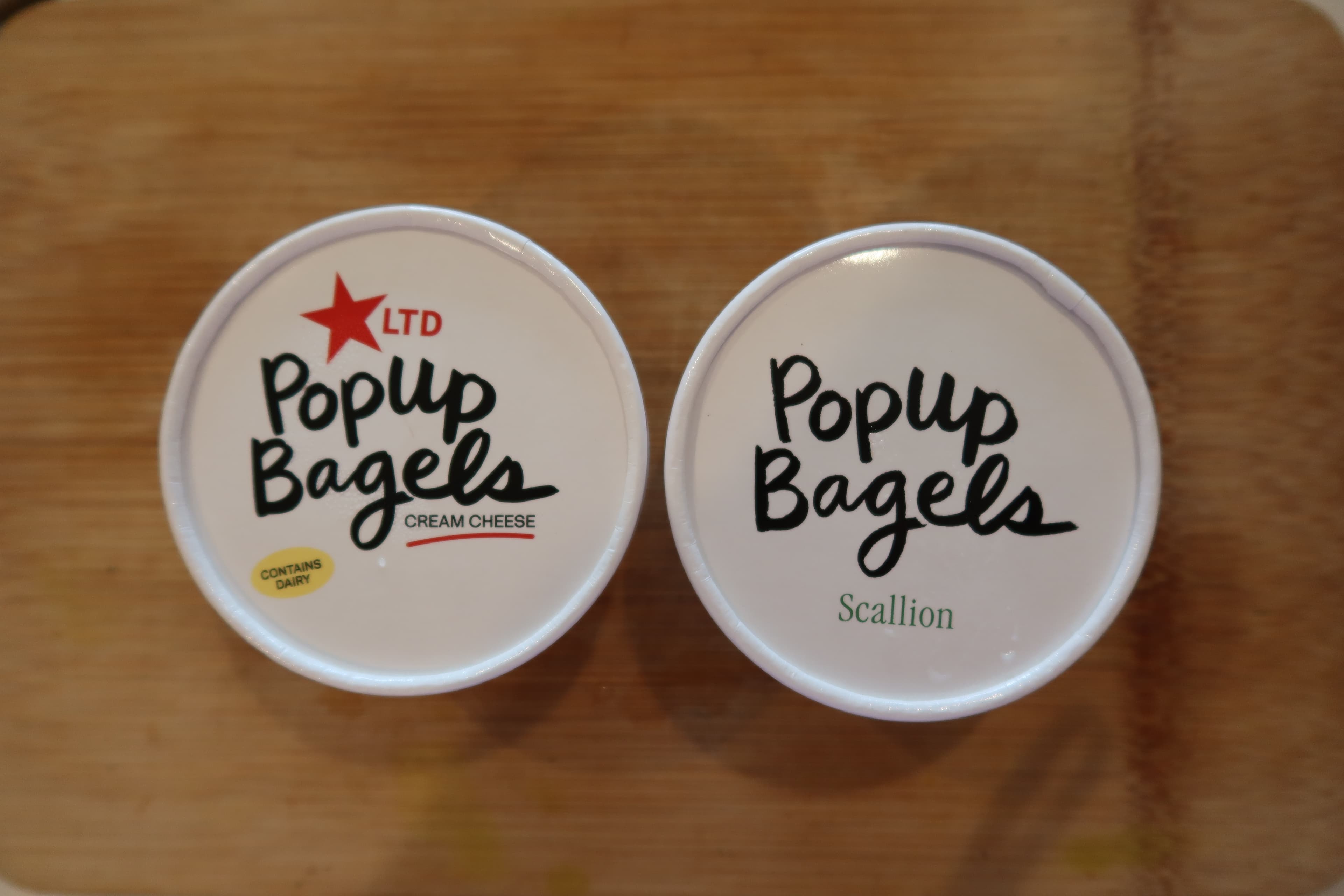 a photo of popup bagels bag schmear